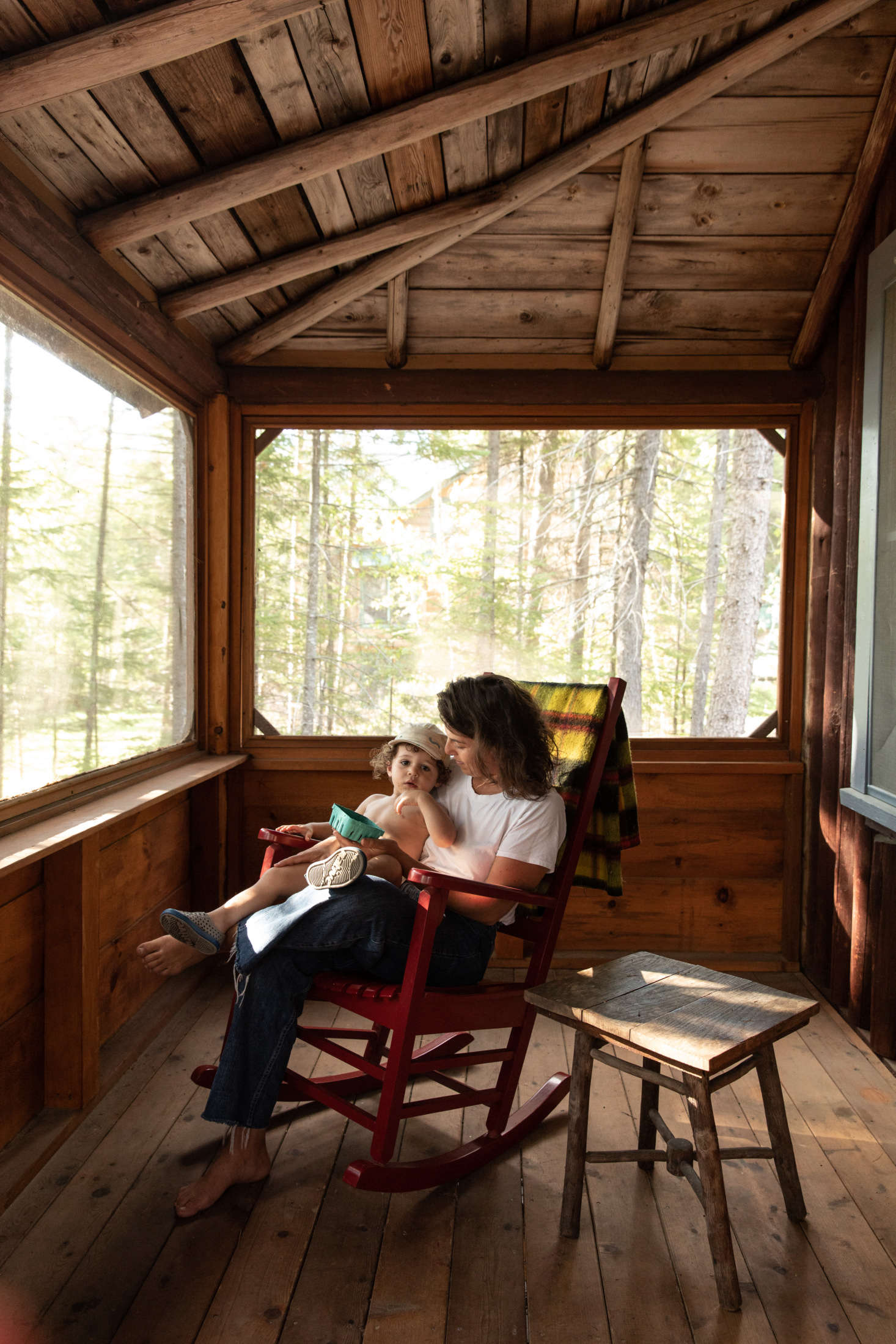 Jocelyn and her son on the cabin