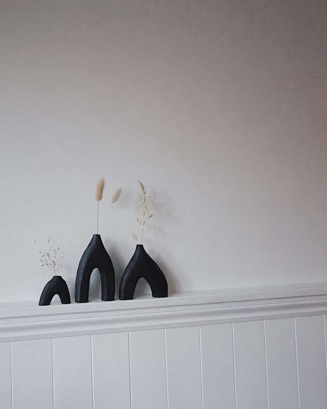 Hand-carved vases made of ebonized wood: a sampling of what