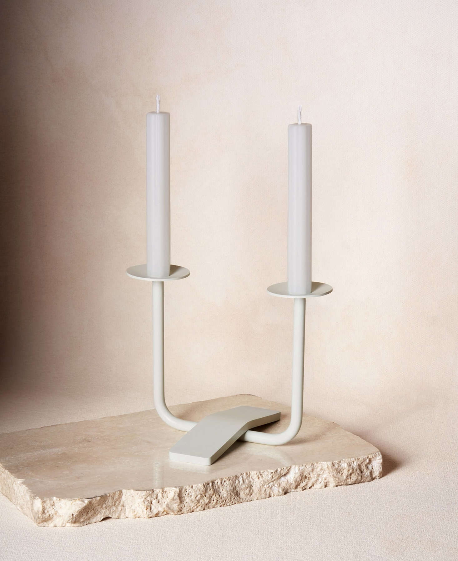 The steel Rest Candleholder, $85, in Cloud. 
