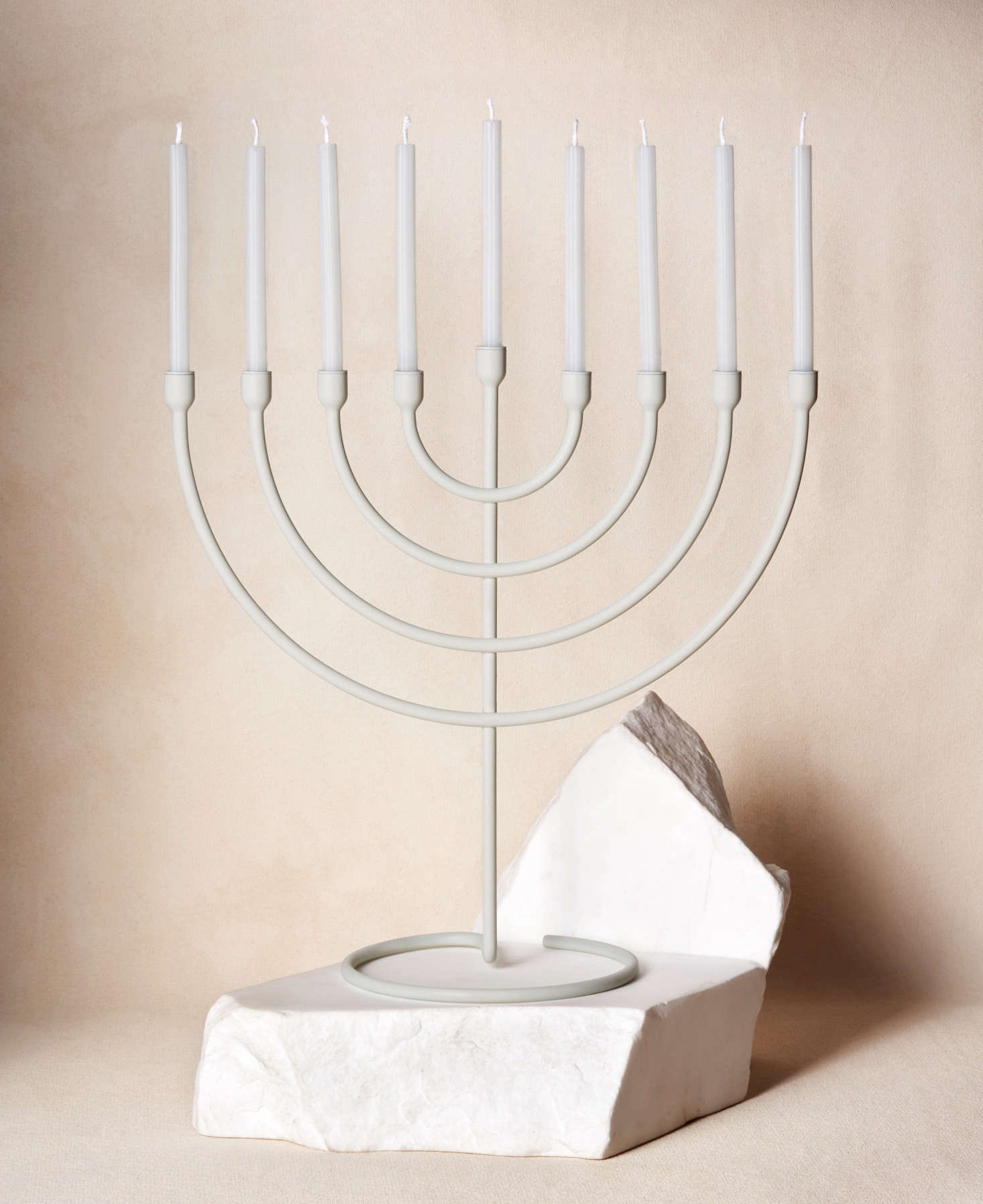 The Trace Chanukiah, $5, is made of steel and comes in five colors. It holds eight candles, one for each night of Hanukkah, but can also be used throughout the year: “We were thinking about how each item is a design piece for the home, not something that lives in a closet most of the time,” Schwartz told Vogue.