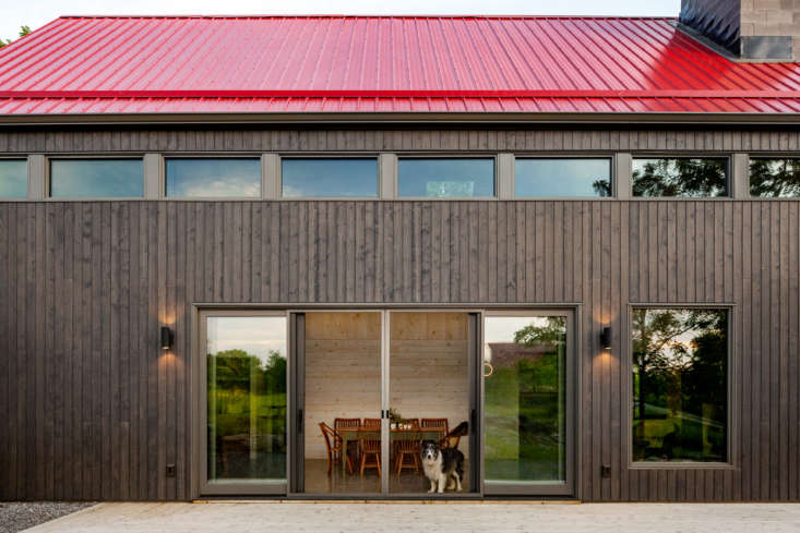 champ in front of the the \1o foot sliding doors. the clerestory windows on the 27