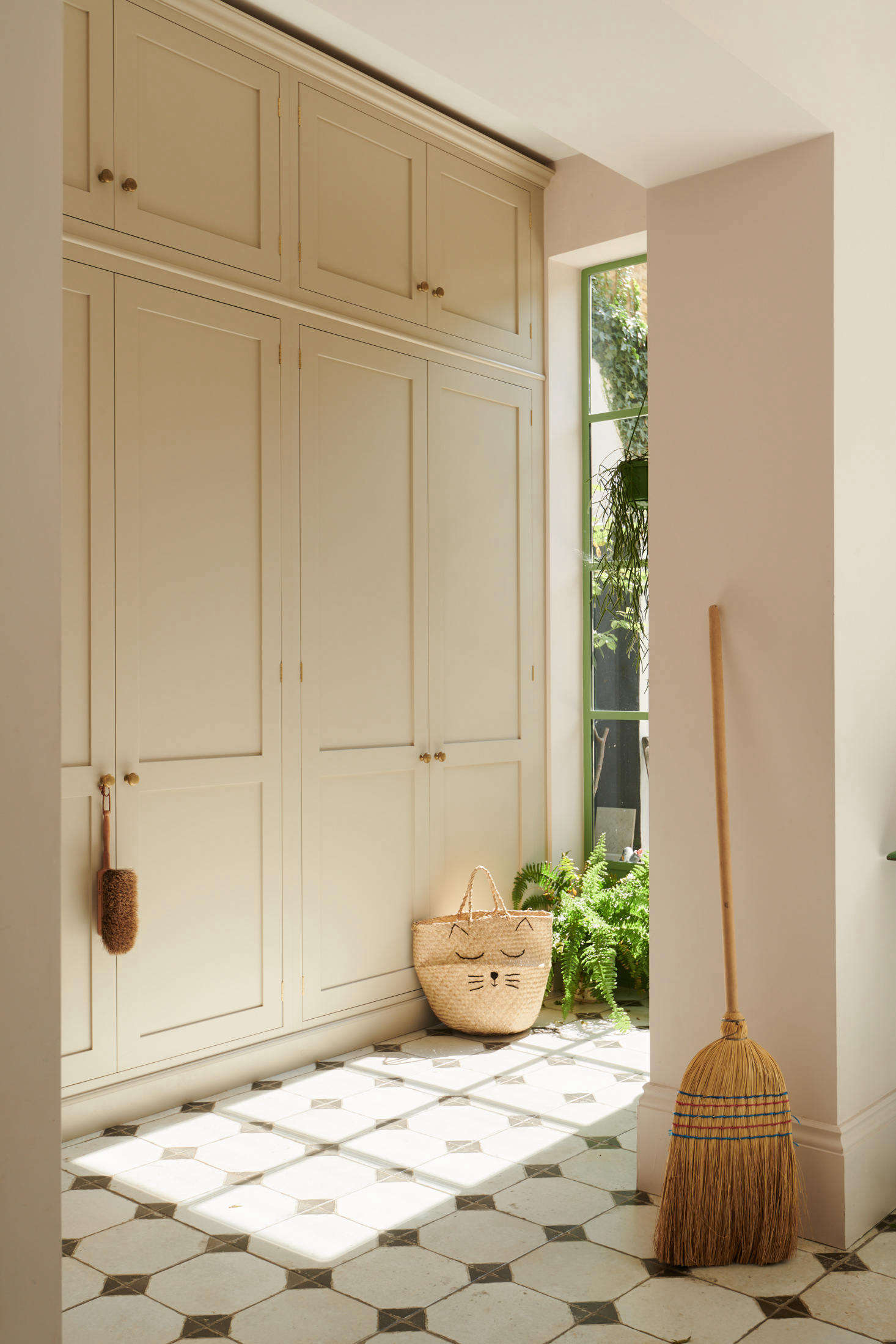 The next set of the doors on the far right conceal the washer and dryer.