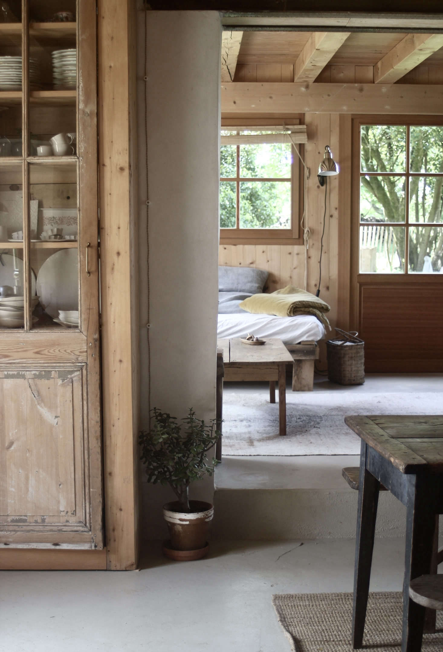 Jean incorporated an old door into his design for the kitchen china cupboard.