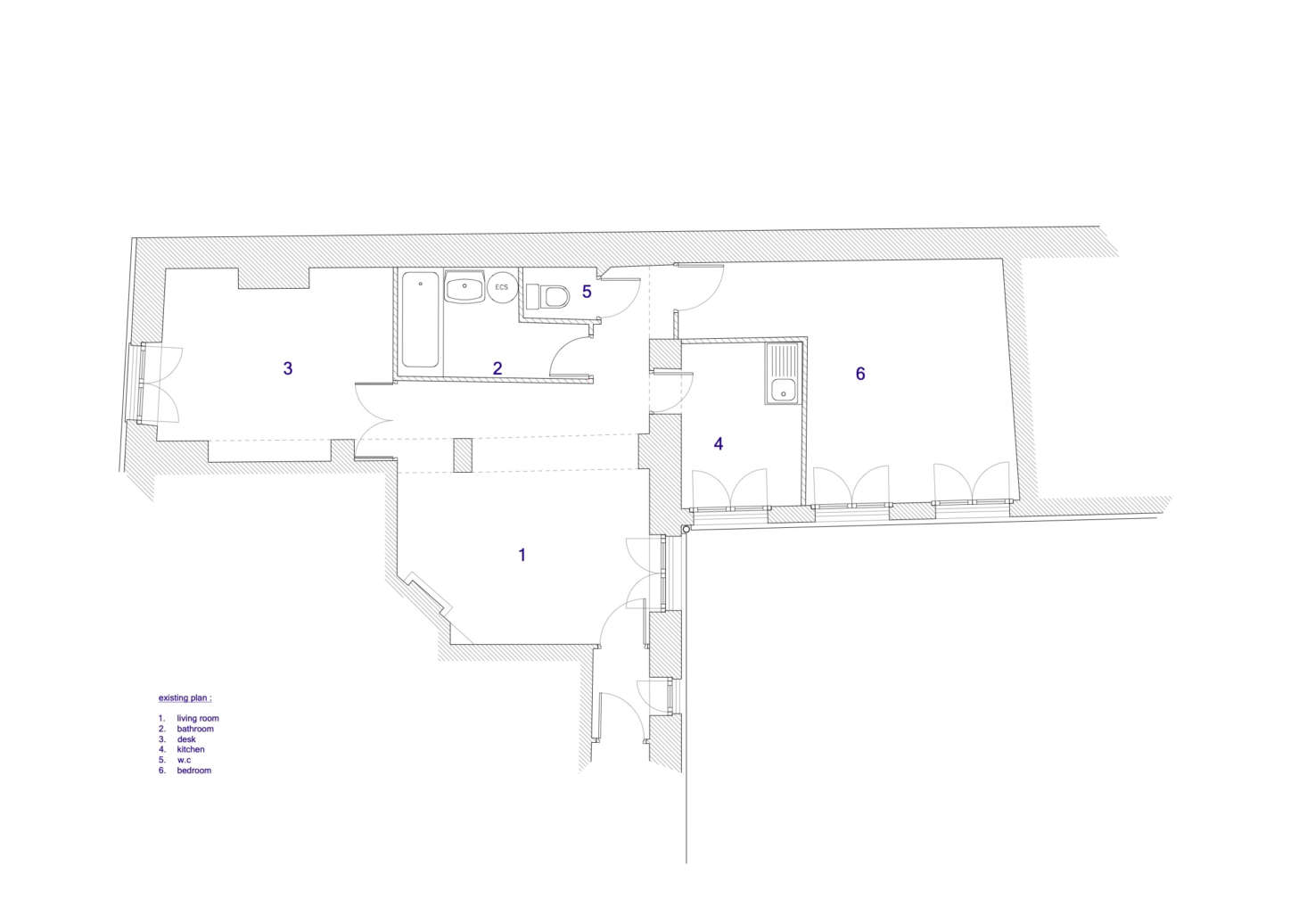 Before: The rooms felt cramped and dark, and the kitchen was located off the living room.