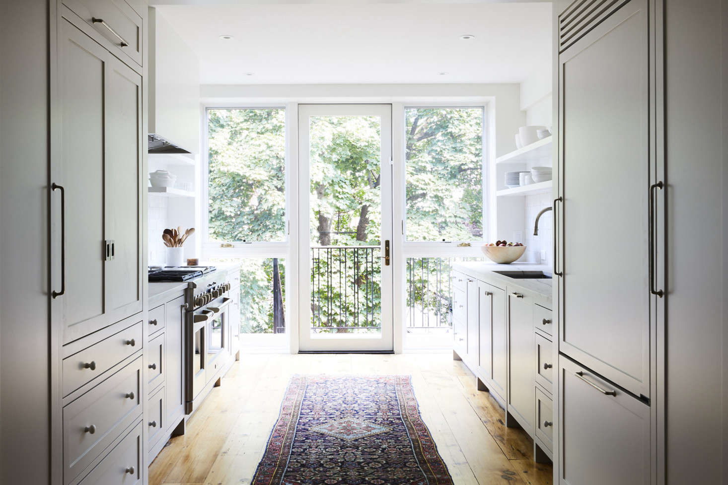 To separate the new .5-foot-wide kitchen and provide plenty of storage, Bangia and Agostinho designed a 