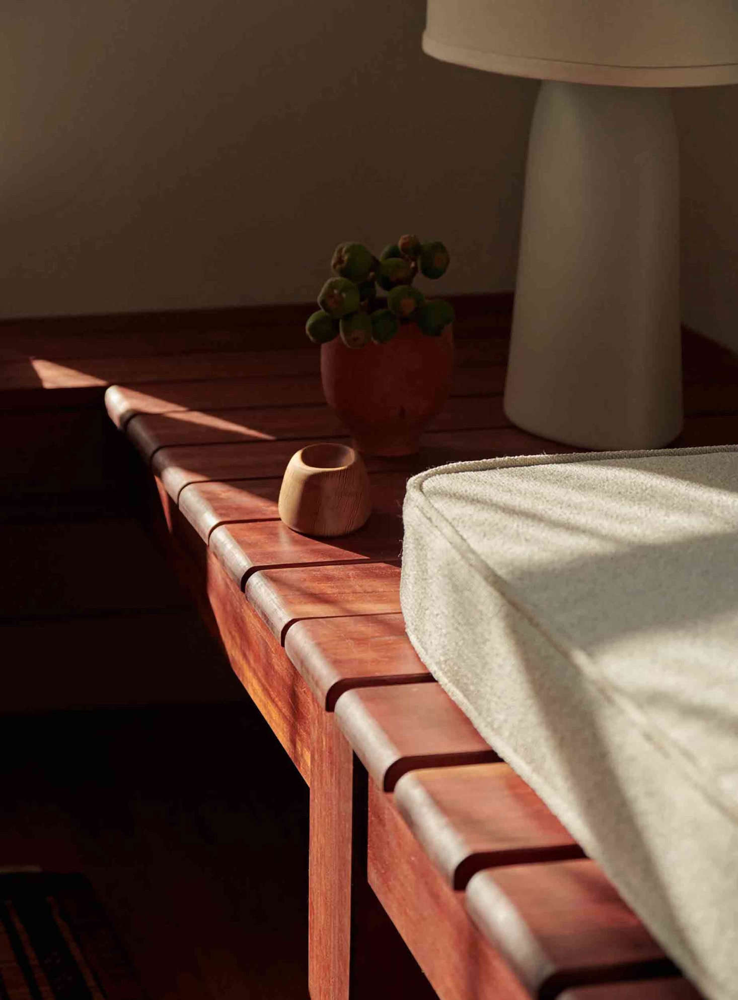 A seamless segue from seating to side table. Many of the built-ins were constructed by artist Nik Gelormino.