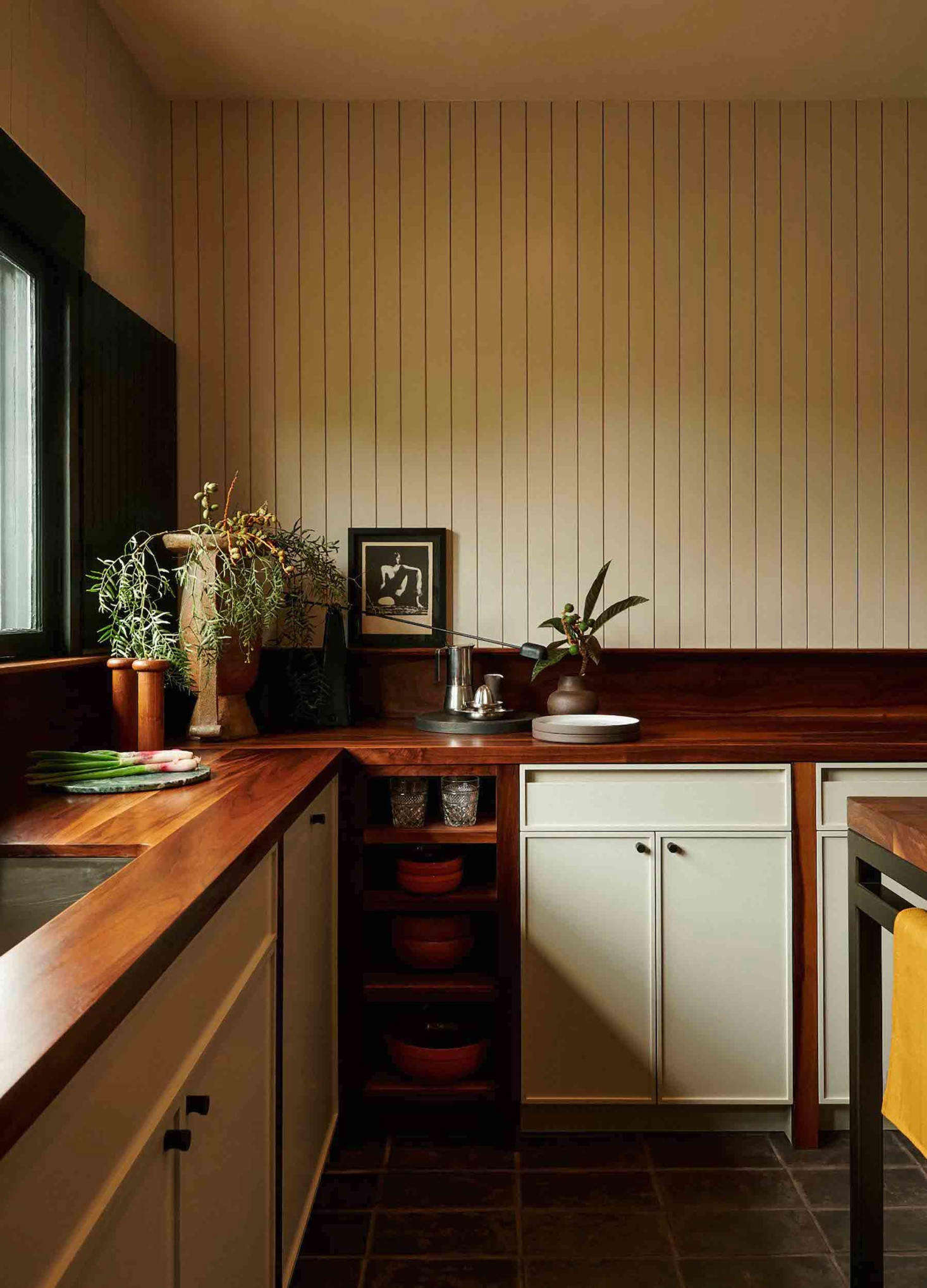 The groove paneled walls in the kitchen are painted Benjamin Moore