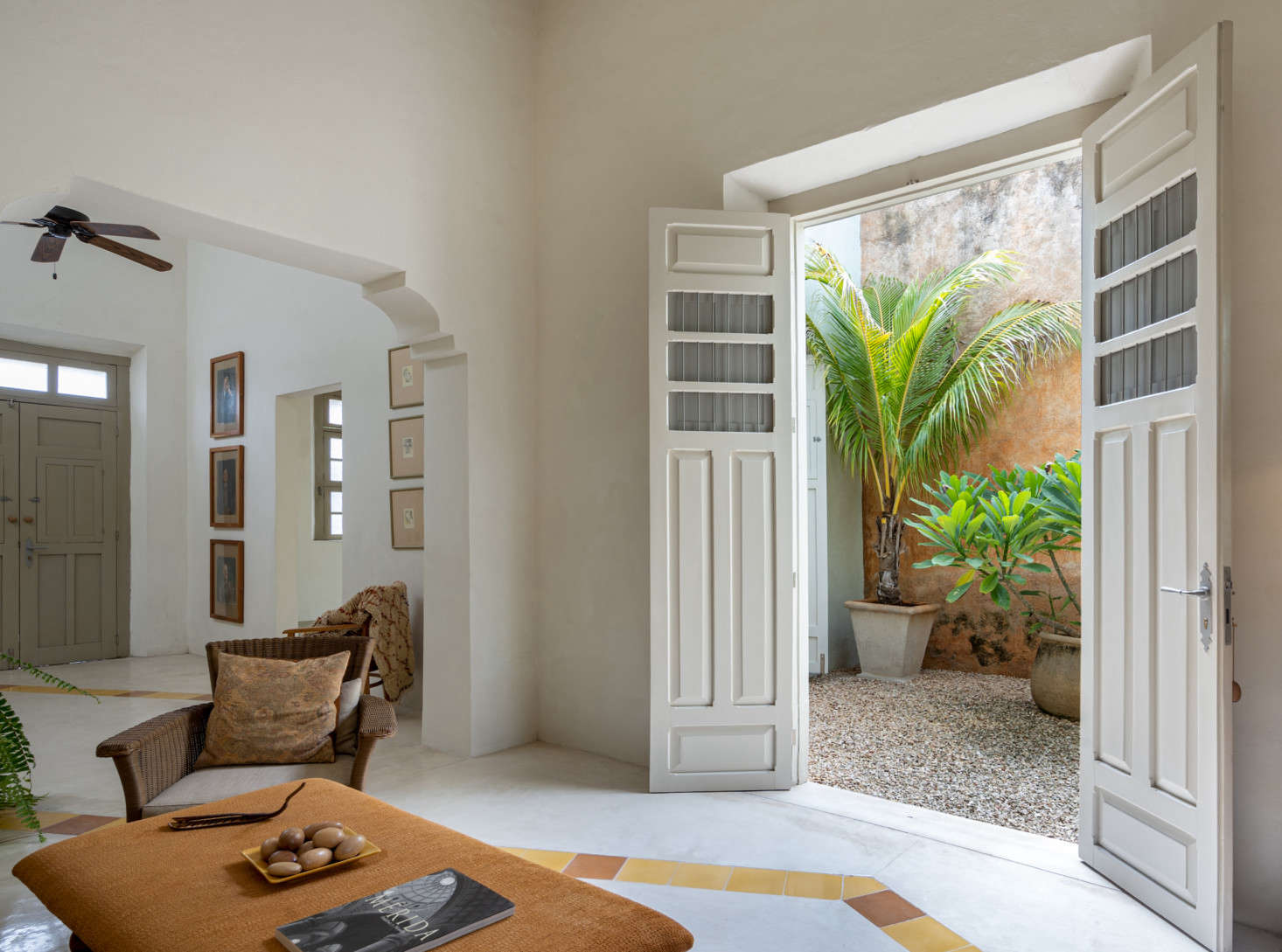 The foyer opens into the living room. 