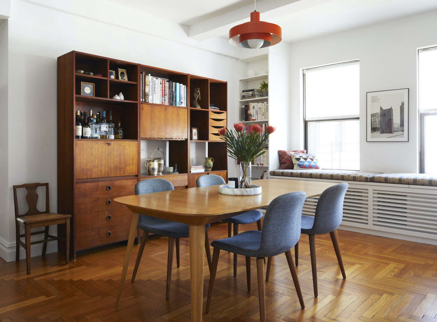 In the dining room, more vintage lighting in the form of a 60s Equator Pendant by Jo Hammerborg for Fog and Morup from data-src=