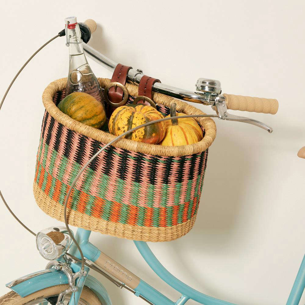 Handwoven in Ghana, the Baba Tree Large Multicolor Bicycle Basket, $95, is one of several available in different patterns and sizes from fair-trade global marketplace Goodee.