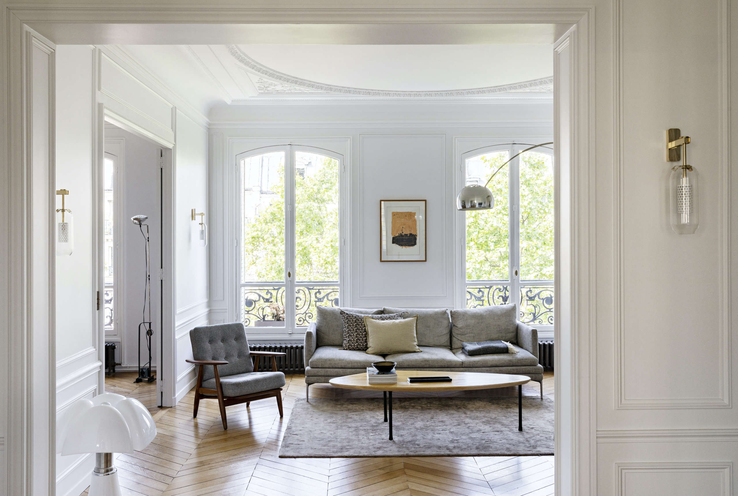 neutral tones, parisian oak flooring, and haussmanian architectural details mak 17