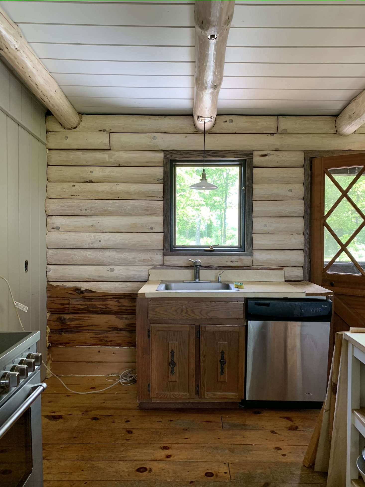 The kitchen in progress (old cabinets included).