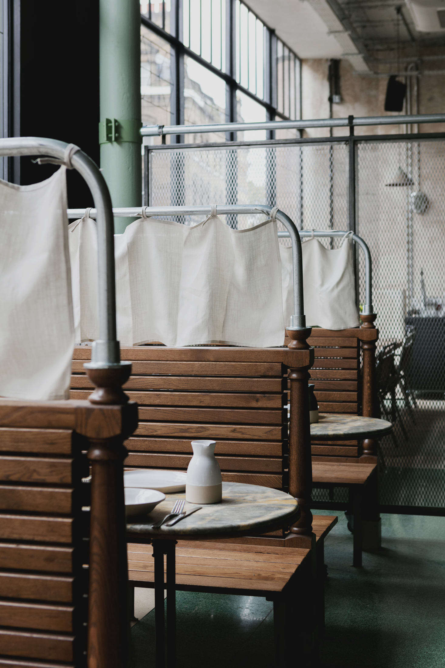 Marble tables and a palette of greens. Photo by Mariell Lind Hansen, courtesy of Red Deer.