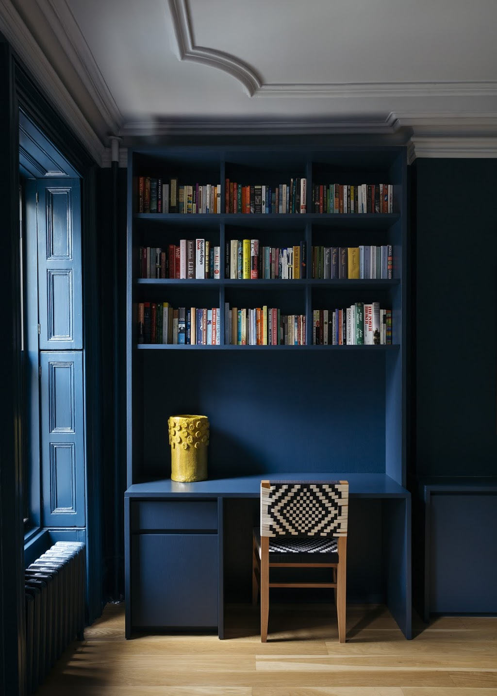The built-ins, walls, even the shutters are all painted in Farrow & Ball’s Hague Blue 