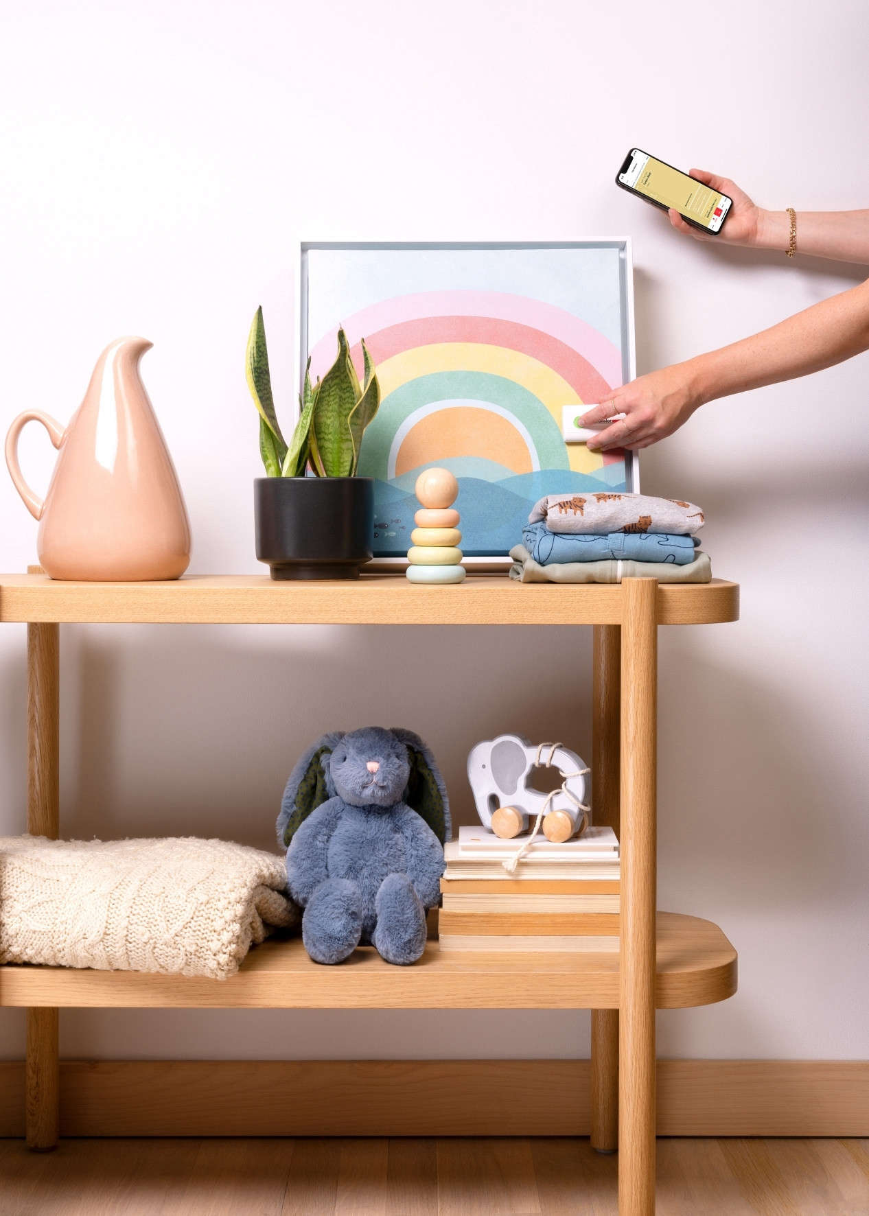 Above: Wall decor and prints can be a great starting point for a room color palette. Here, we’re taking a scan of the yellow in this print to find a paint color match for this nursery’s walls.