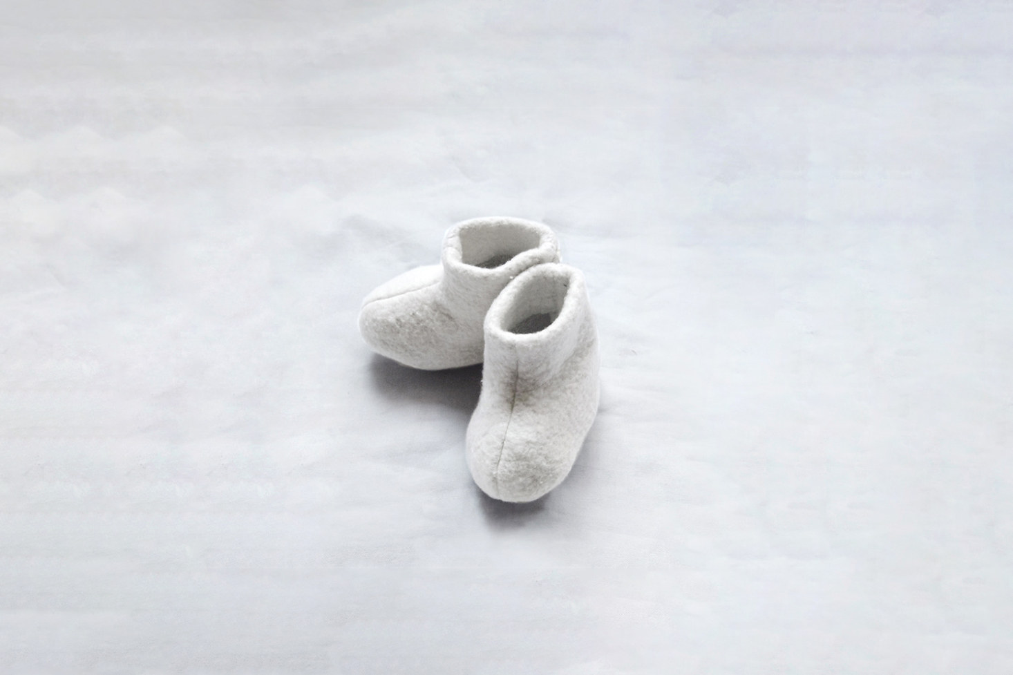The Newborn Cotton Booties are the sort of booties that actually stay on a baby