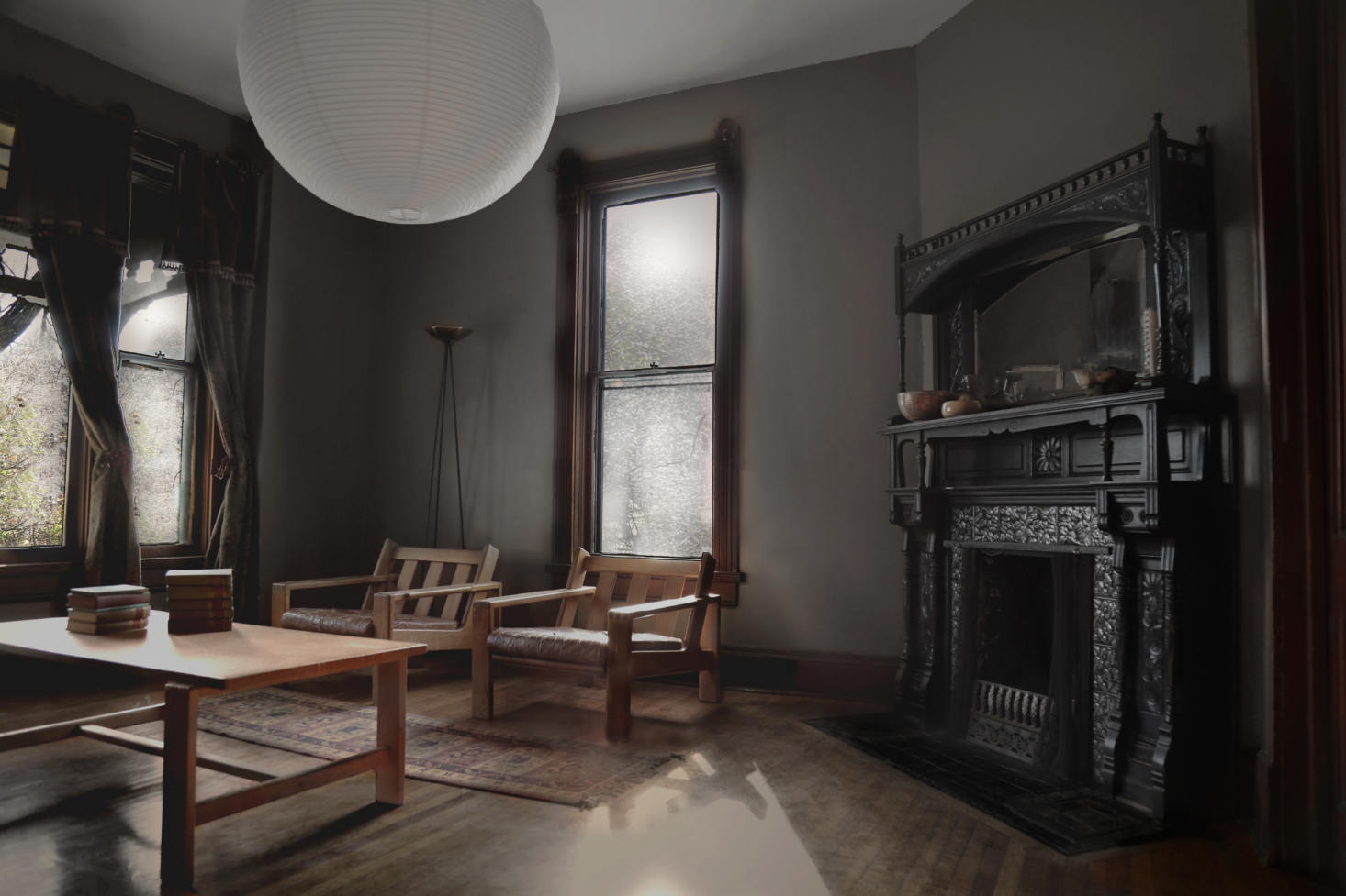 The living room is painted in Limestone by Sherwin Williams and features sculptural seating from a surprising source: Craigslist (