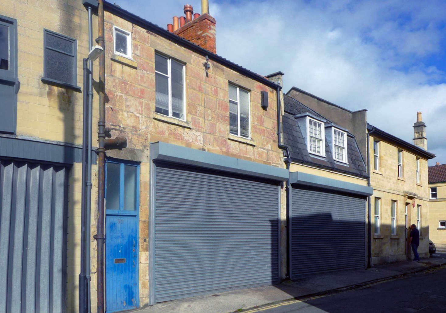 Located on Circus Place, the stone structure with the blue door had, like other buildings on the block, been converted into a garage in the 80s.