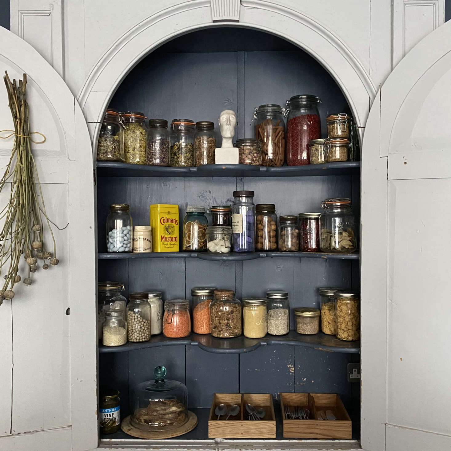 Another eBay purchase, an th century cupboard provides storage on the back wall of the kitchen.