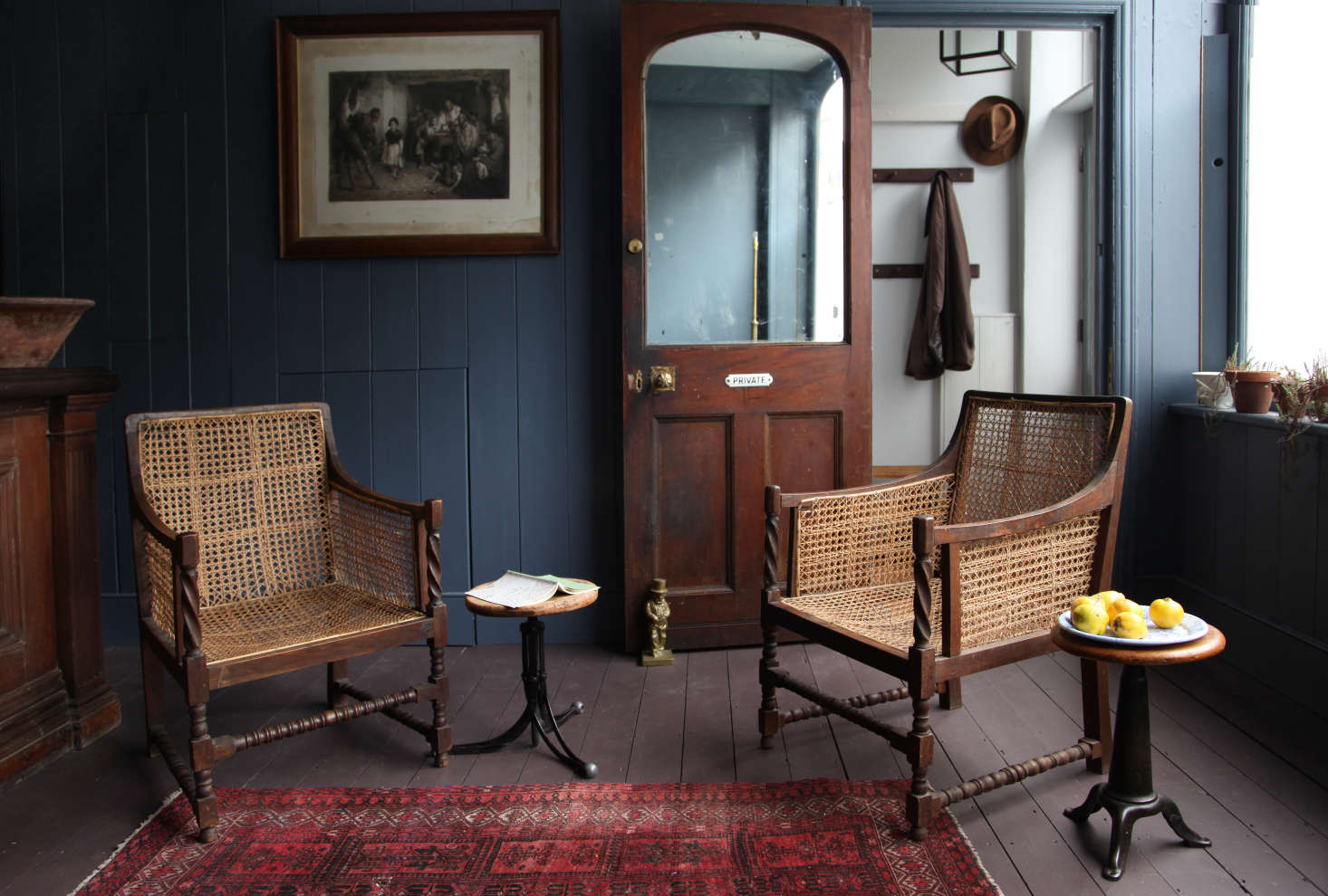 A newly installed 90s mirrored door opens to the mews living quarters and kitchen, approximately 300 square feet. Upstairs there are two bedrooms, and the plan is to rent the house for short-term stays (but during the pandemic it