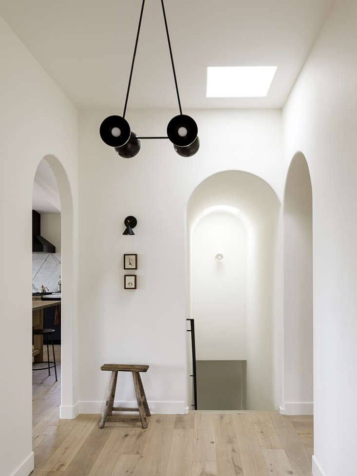 a hallway in a a serene, well balanced house for a violinist and a physician, i 24