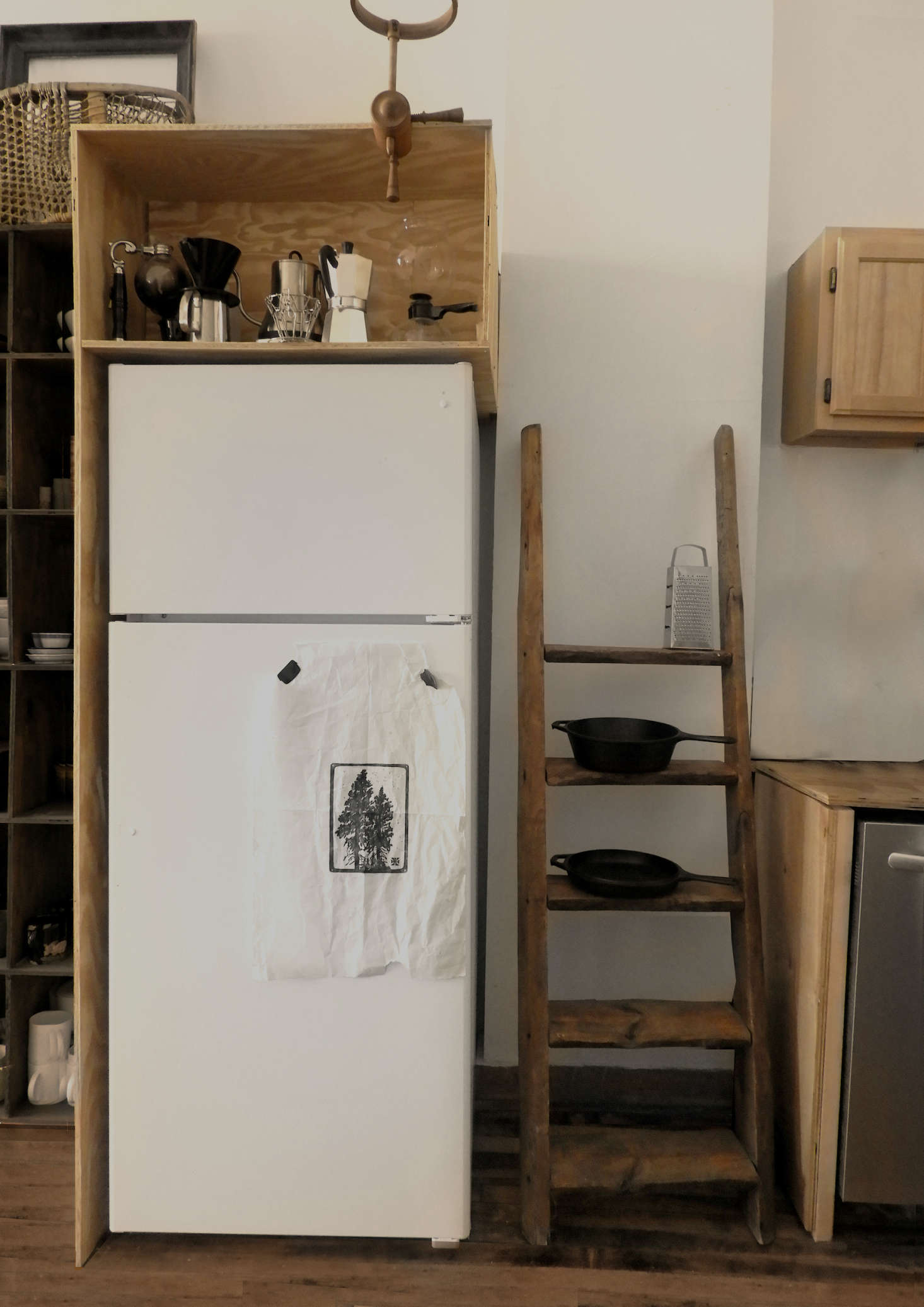 Lauren and Jeff also built a shelving unit around the refrigerator. 