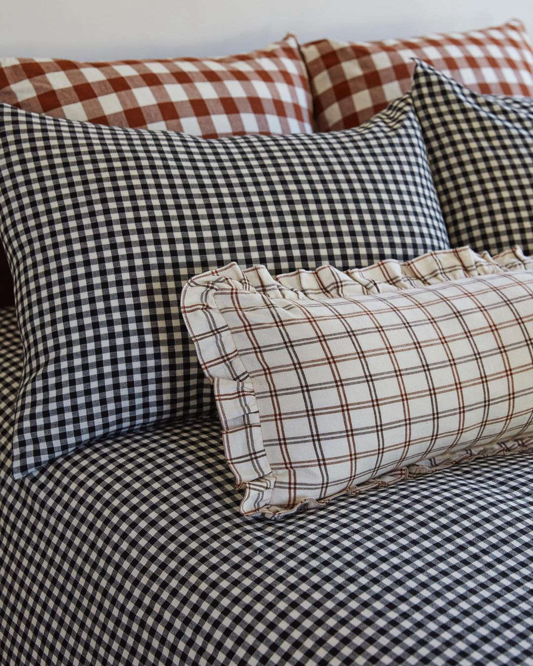 The Mini Gingham Duvet Cover in Black, starting at $5.