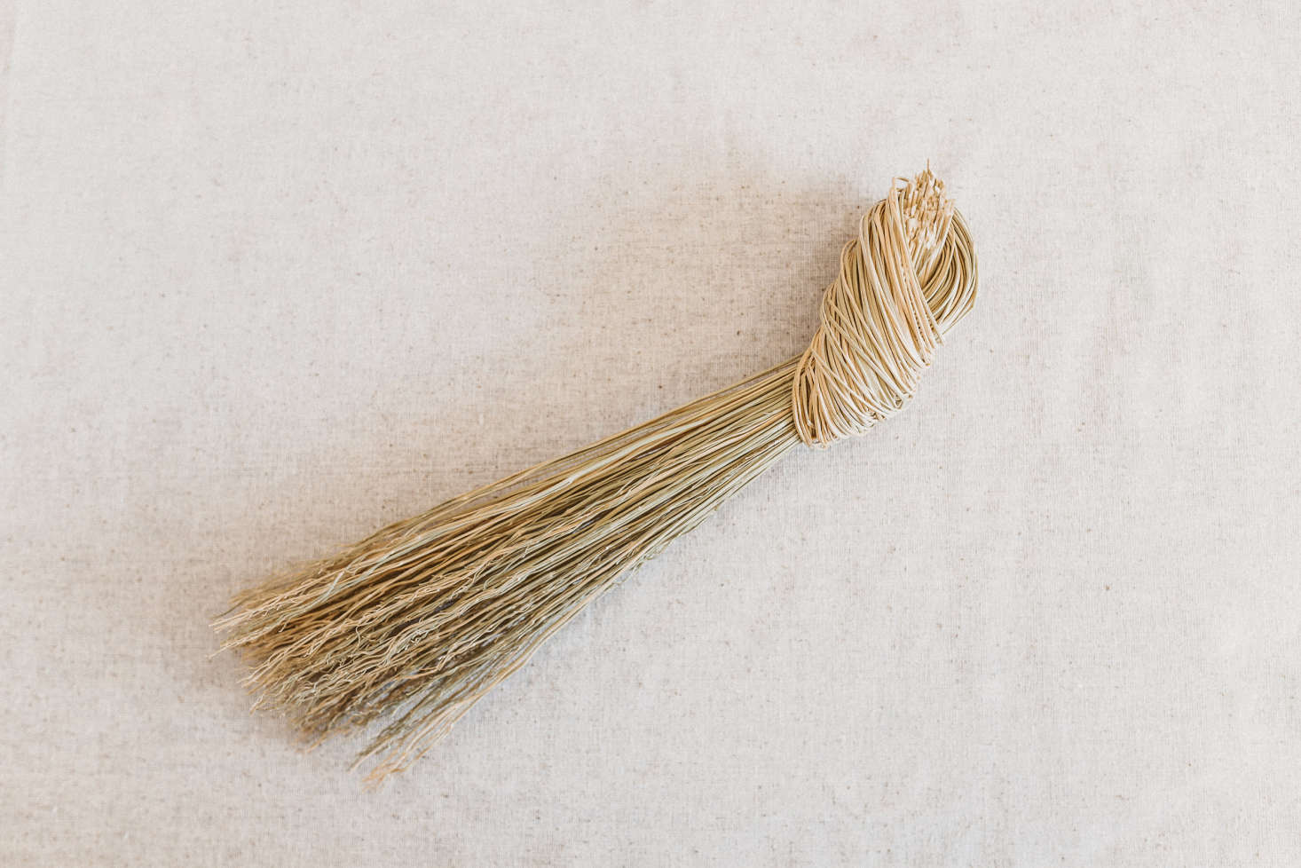 I particularly love the small, simple Knot Broom ($8), with a handle of tied broomcorn.