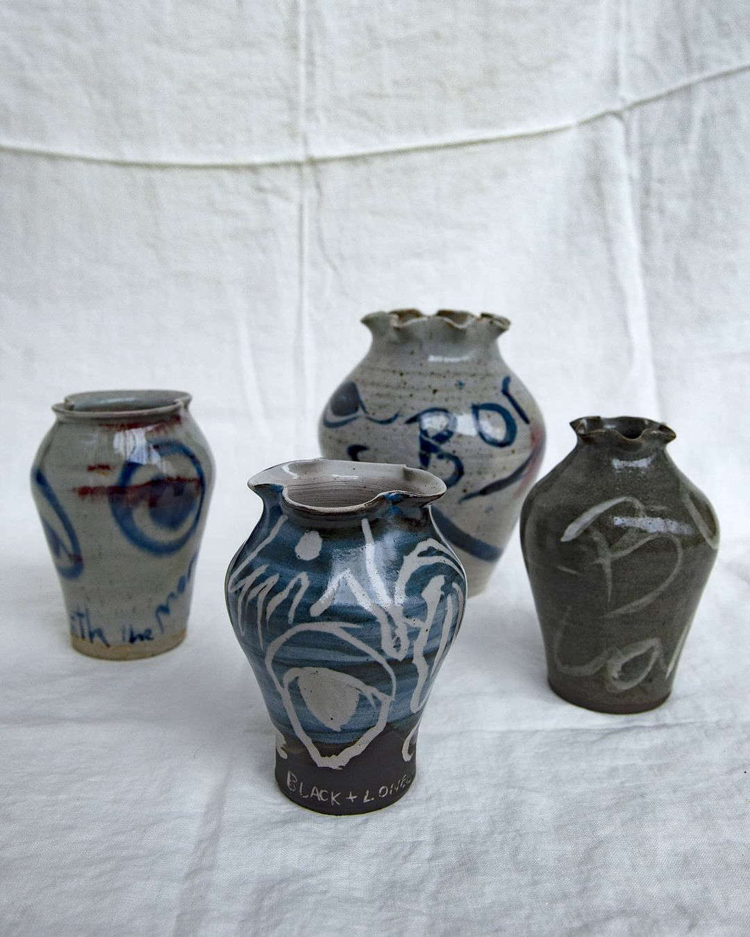 Her slipware pots (priced from £70 to £360) use either sgraffito and/or slip painting techniques. Sgraffito, Italian for 