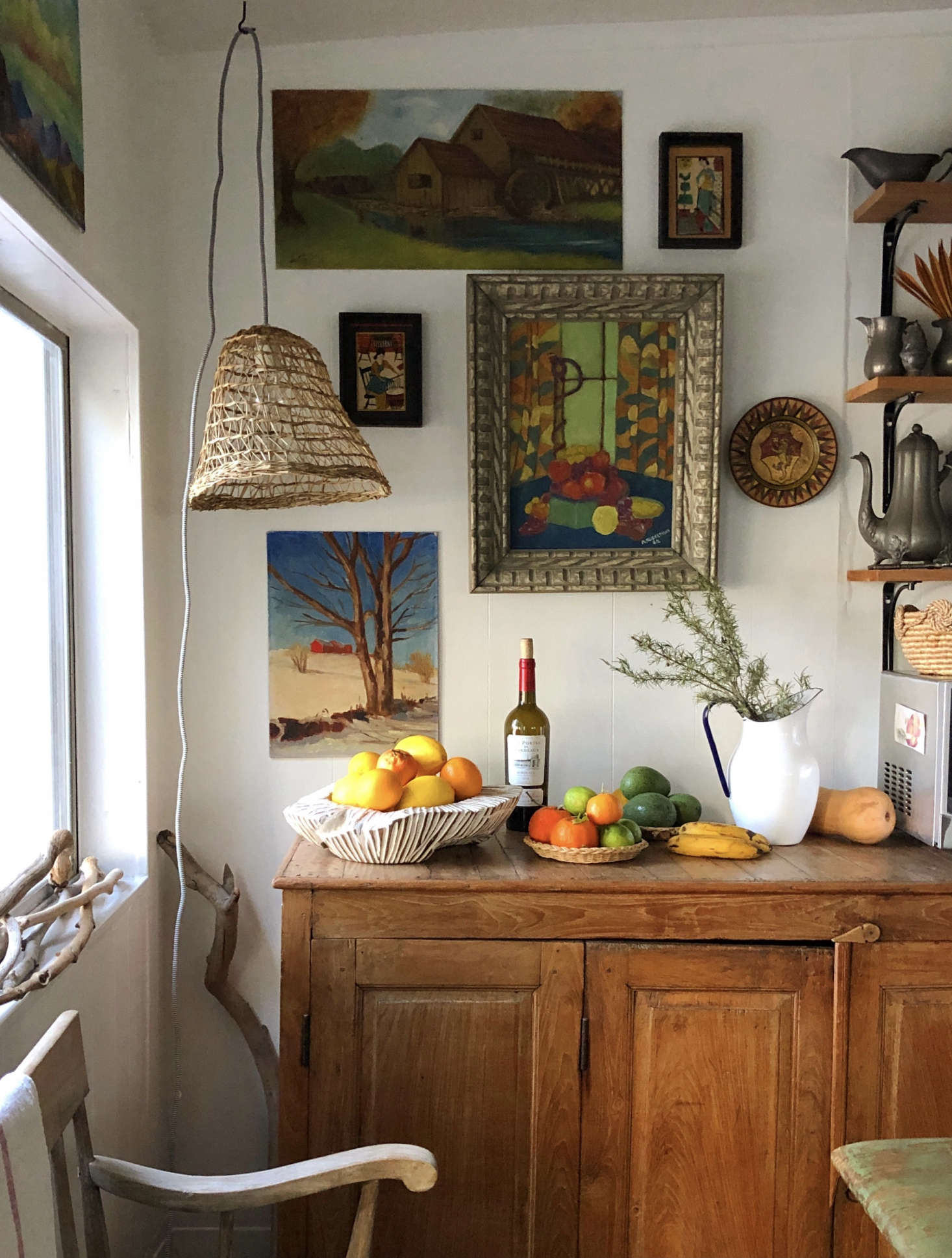 Both the kitchen cabinets and the walls in her home are painted Behr