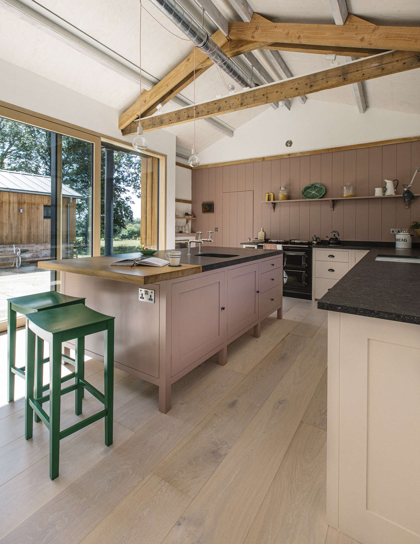 The island has an oak counter that serves as work surface and nice place to sit. (There