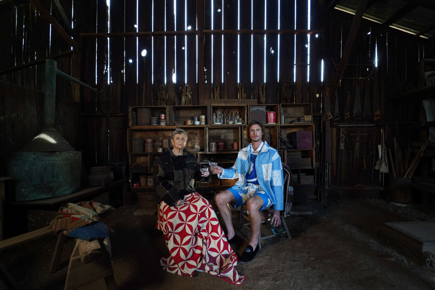 San Diego surfer and fashion designer Tristan Detwiler, , designs, stitches, and models the Stan collection, his of line of patchwork jackets and work coats that just debuted its fall line at New York Fashion Week. The show was shot at Bumann Ranch in Encintas, CA—Detwiler is shown here (and in our featured image) at the historic homestead with Dr. Claire McKarn