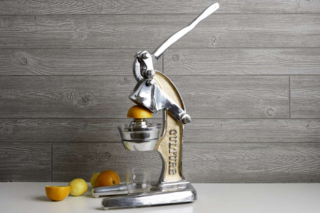 The large Verve Artisan Citrus Juicer is inches high and is available with rose gold or gold trim; $0 from Verve Original.