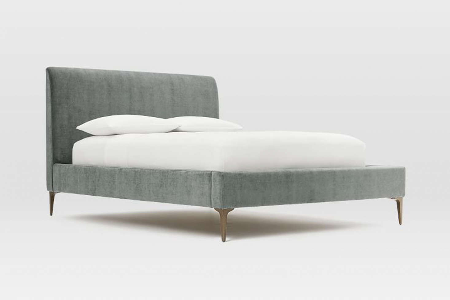 The Andes Deco Upholstered Bed from West Elm is $data-src=