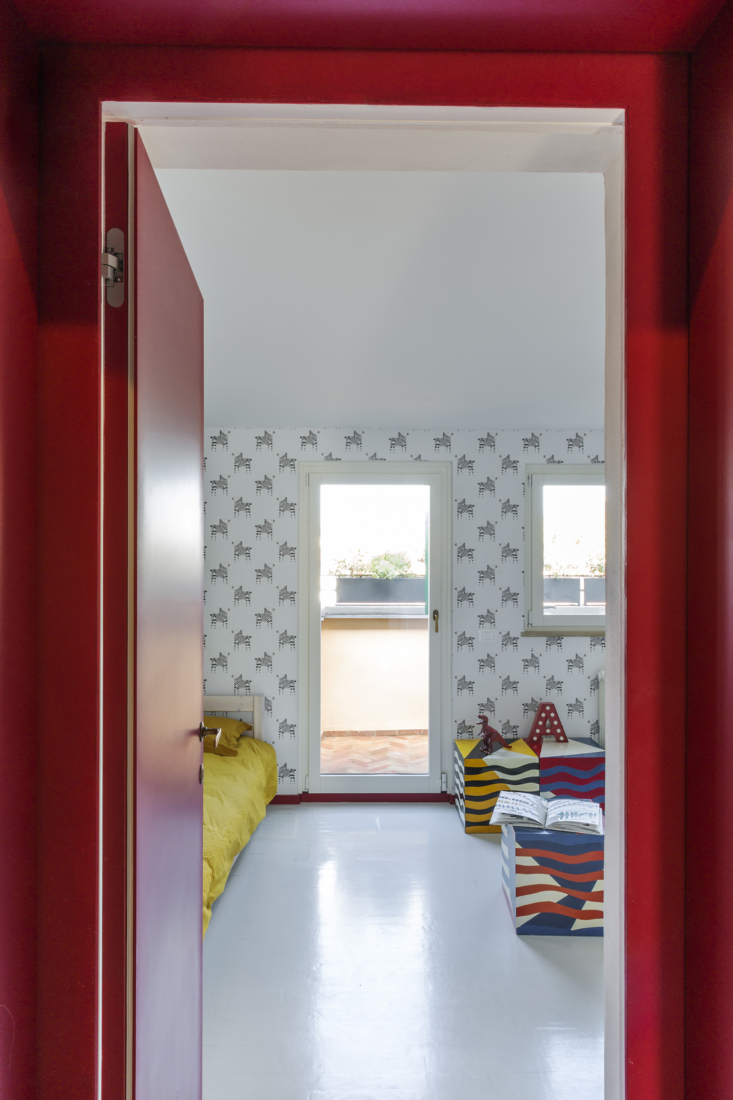 an all red hallway is a reference to the red stripe by the entry and connects t 22