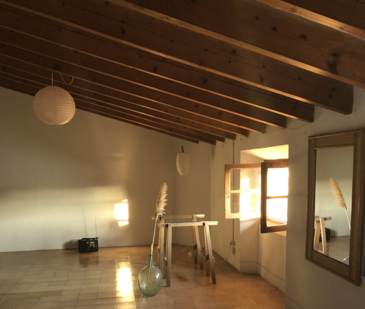 the open top floor bedroom in late evening sun. 37