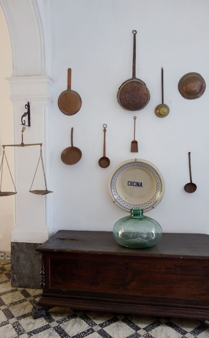 copper pots make for a charmingly ad hoc wall display. 28