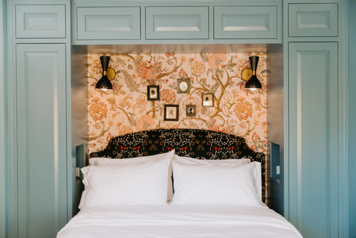 a jaunty wallpapered niche with a mix and match headboard. 24