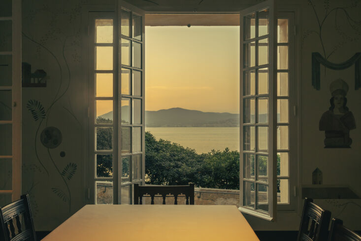 the room overlooks the sea and is available to book for private gatherings. 23