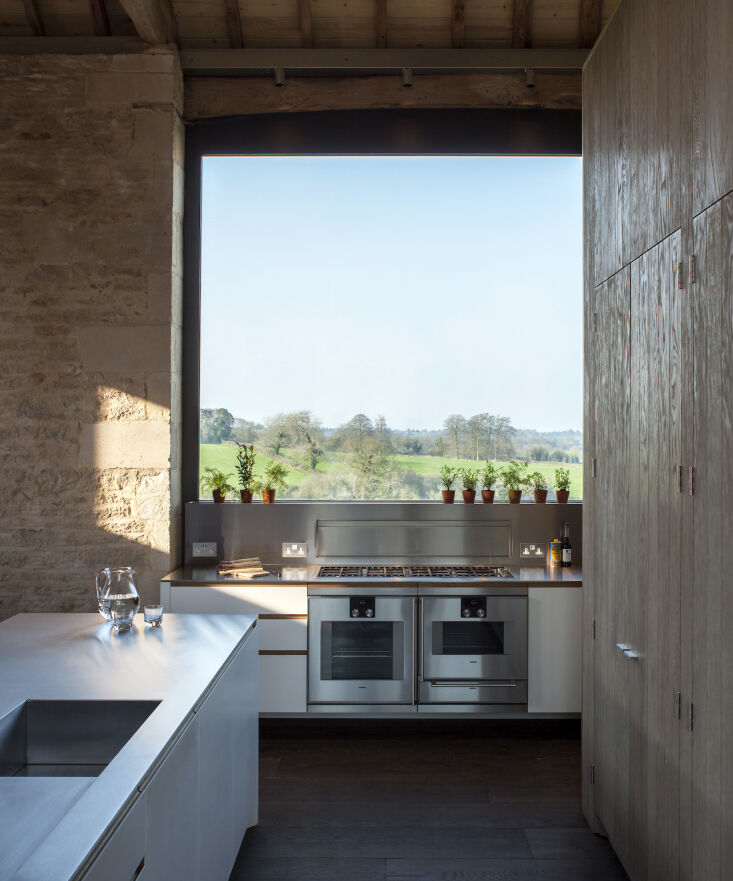 an oversized   window now replaces the double barn doors that were once there.  18