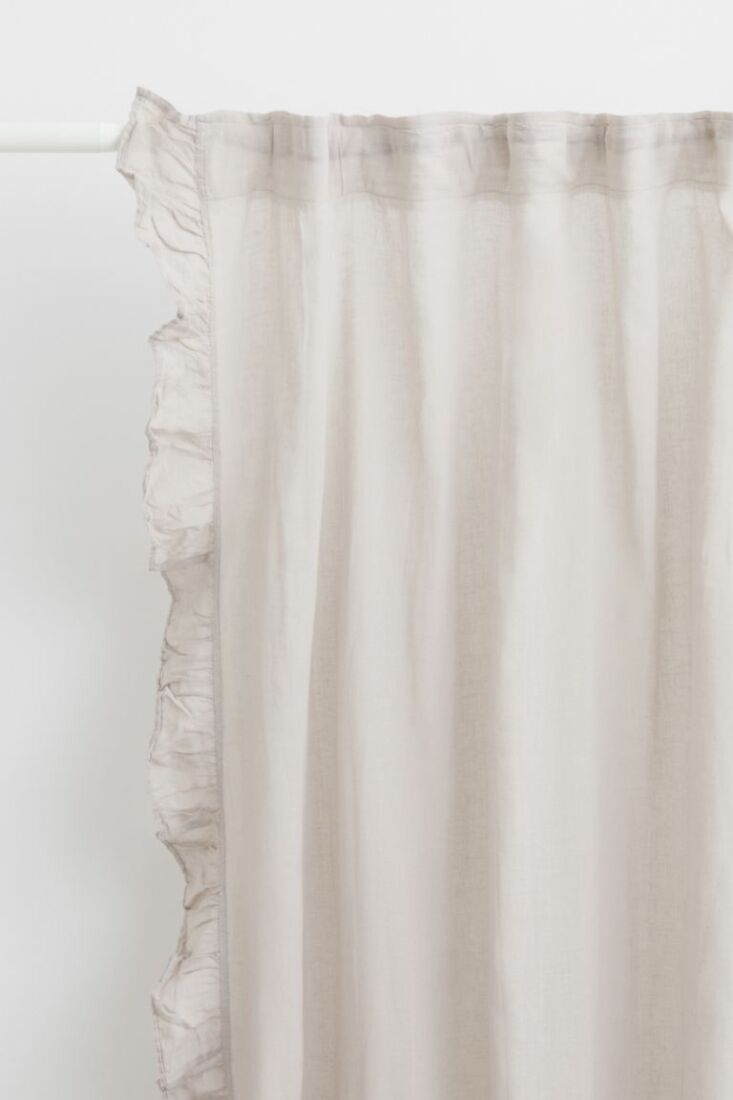 ruffle trimmed curtains, 60 percent cotton, 40 percent linen, are \$69.99 for a 27