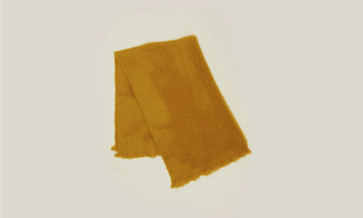 the solid mohair throw in mustard is \$\275 from hawkins new york. 27