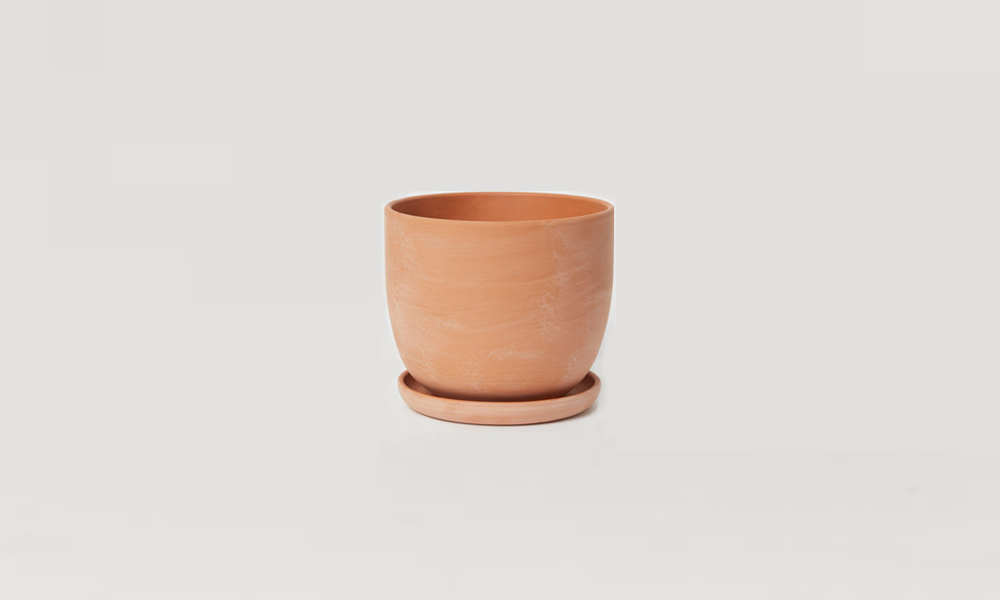 a terra cotta plant pot and saucer is \$\19.99 from h&m home. (we also like 29