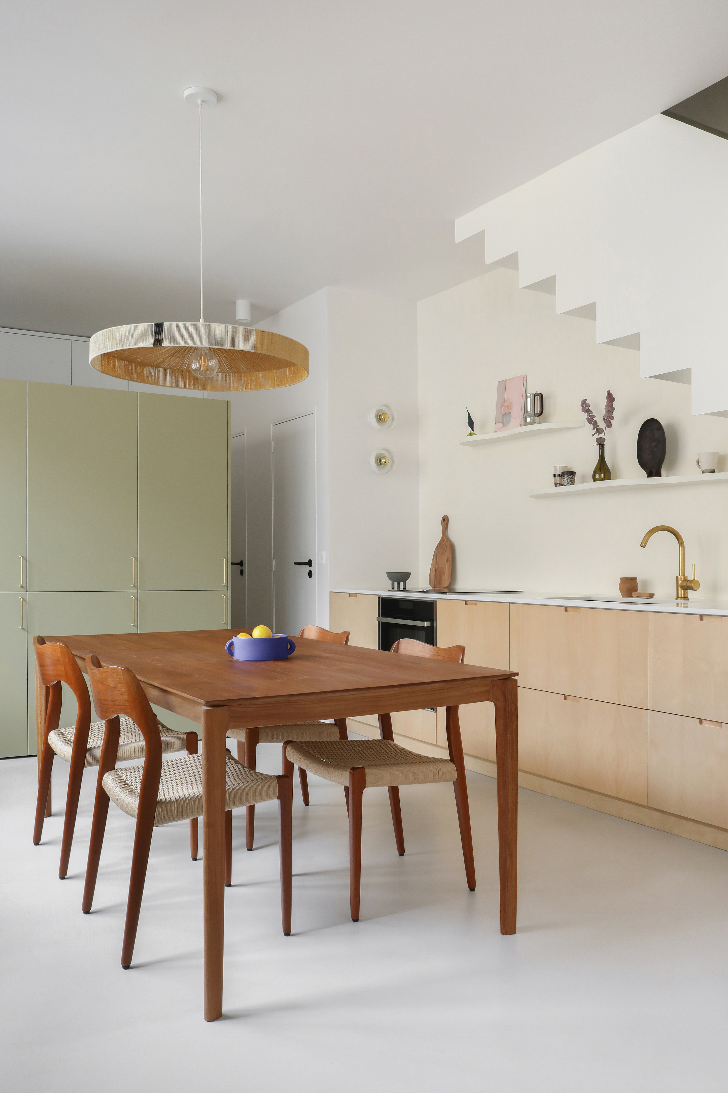 the back cabinets are lacquered wood and the counter is engineered quartz. 18