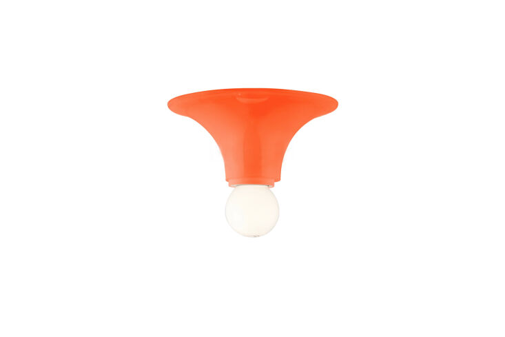 two artemide teti ceiling lights in orange are seen in the wall of storage cabi 24
