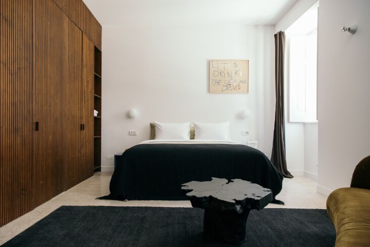 another bedroom features a wood clad wall. (see our report on the subject in tr 21