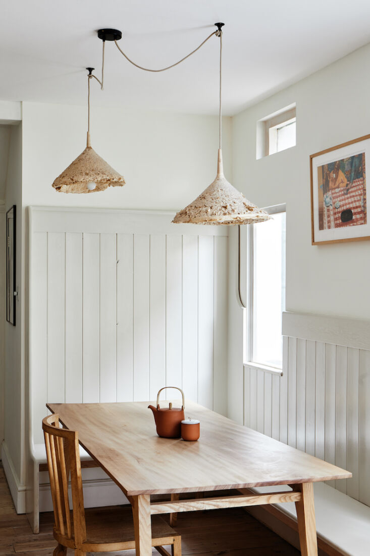 the sebastian cox pendants above the table are grown from mycelium and green wo 23