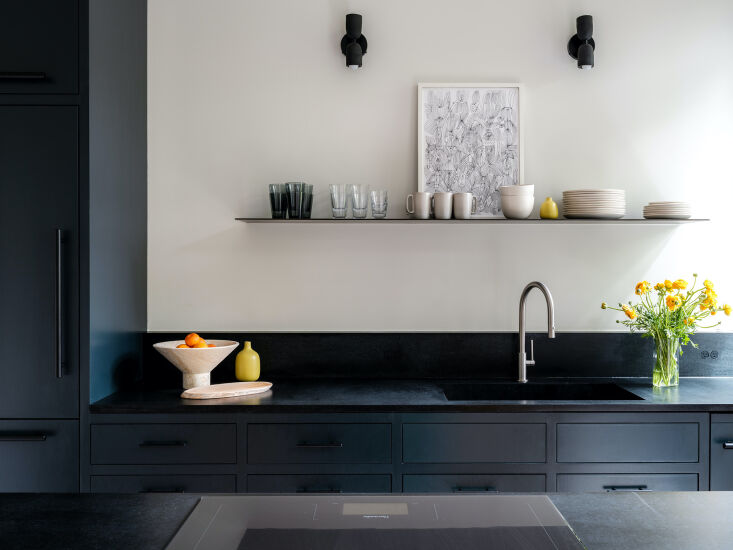 the soapstone, including a custom integrated sink, is from vermont and was sour 18