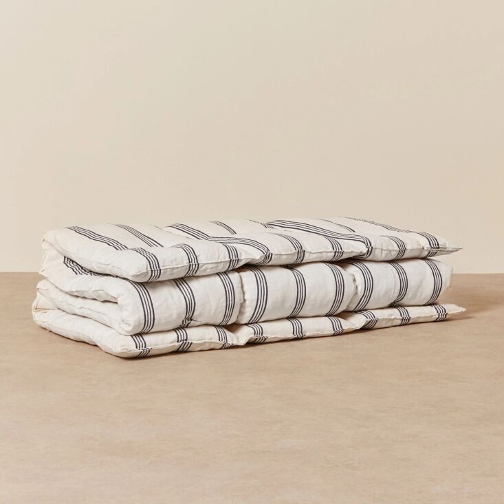 the tensira kapok mattress bedroll in navy blue and off white stripe is \$3\25  26