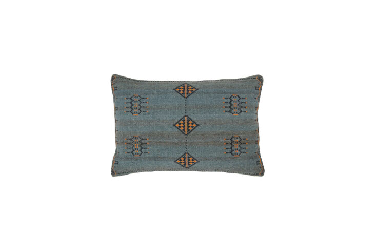 the tanant tribal pillow in dark blue and gold is currently on sale for \$7\1.\ 25
